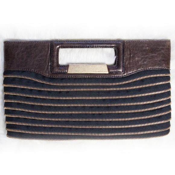 BCBGMaxAzria Handbags - BCBGMaxAzria Urban Rock Zipper Clutch